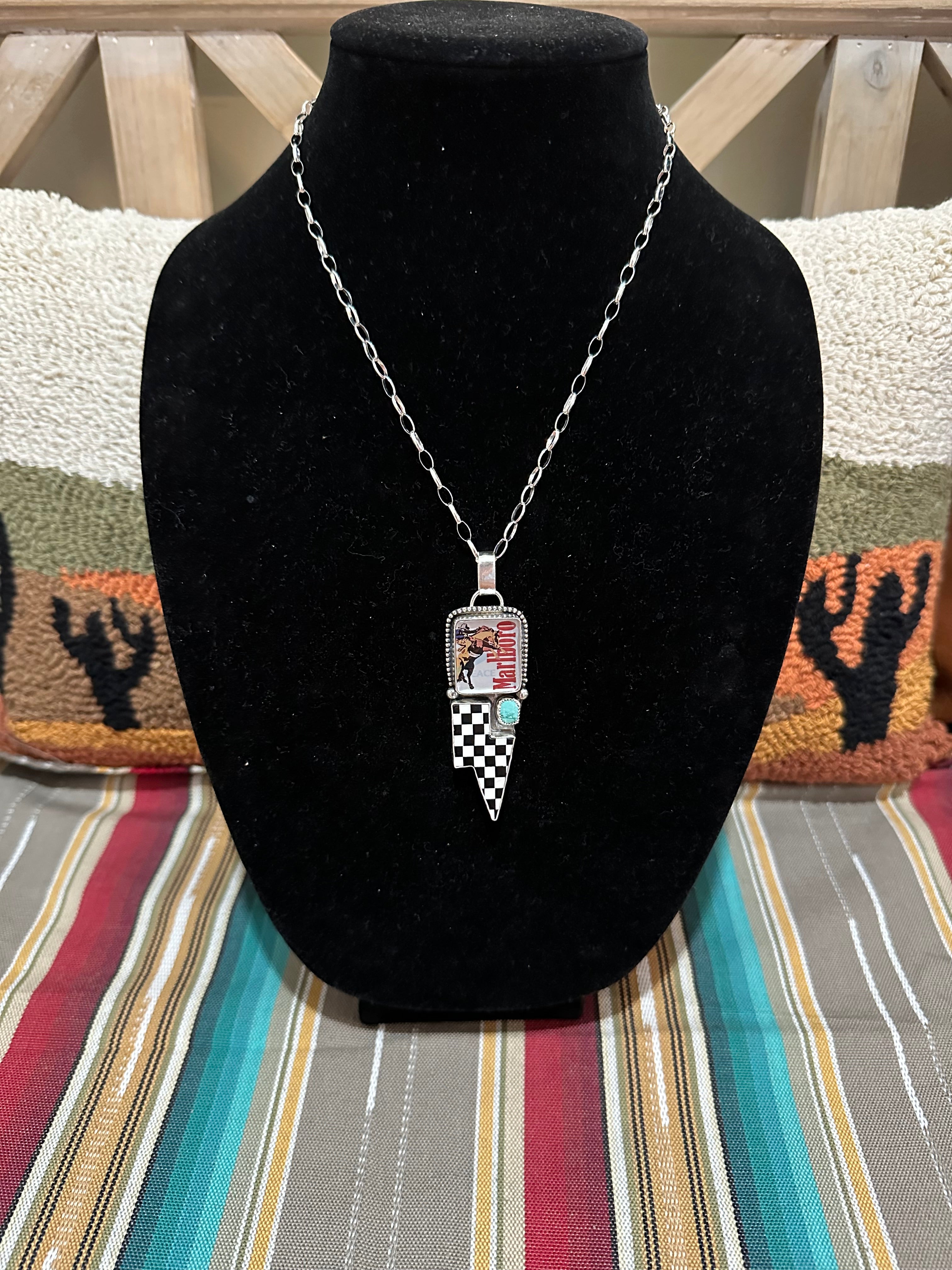 18” Marlboro necklace with checkered lightning bolt and pilot mountain turquoise square