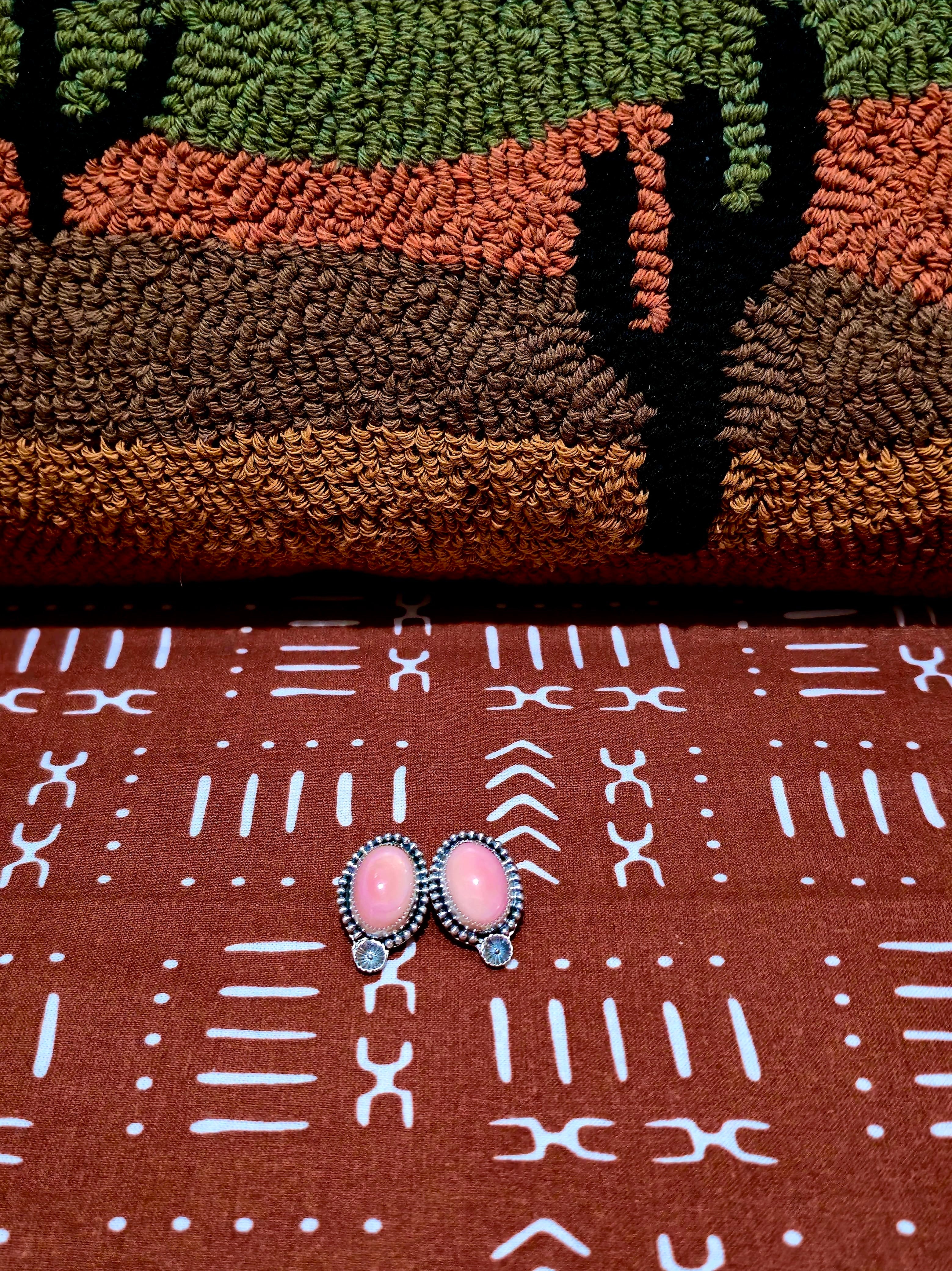 pink conch stud earrings