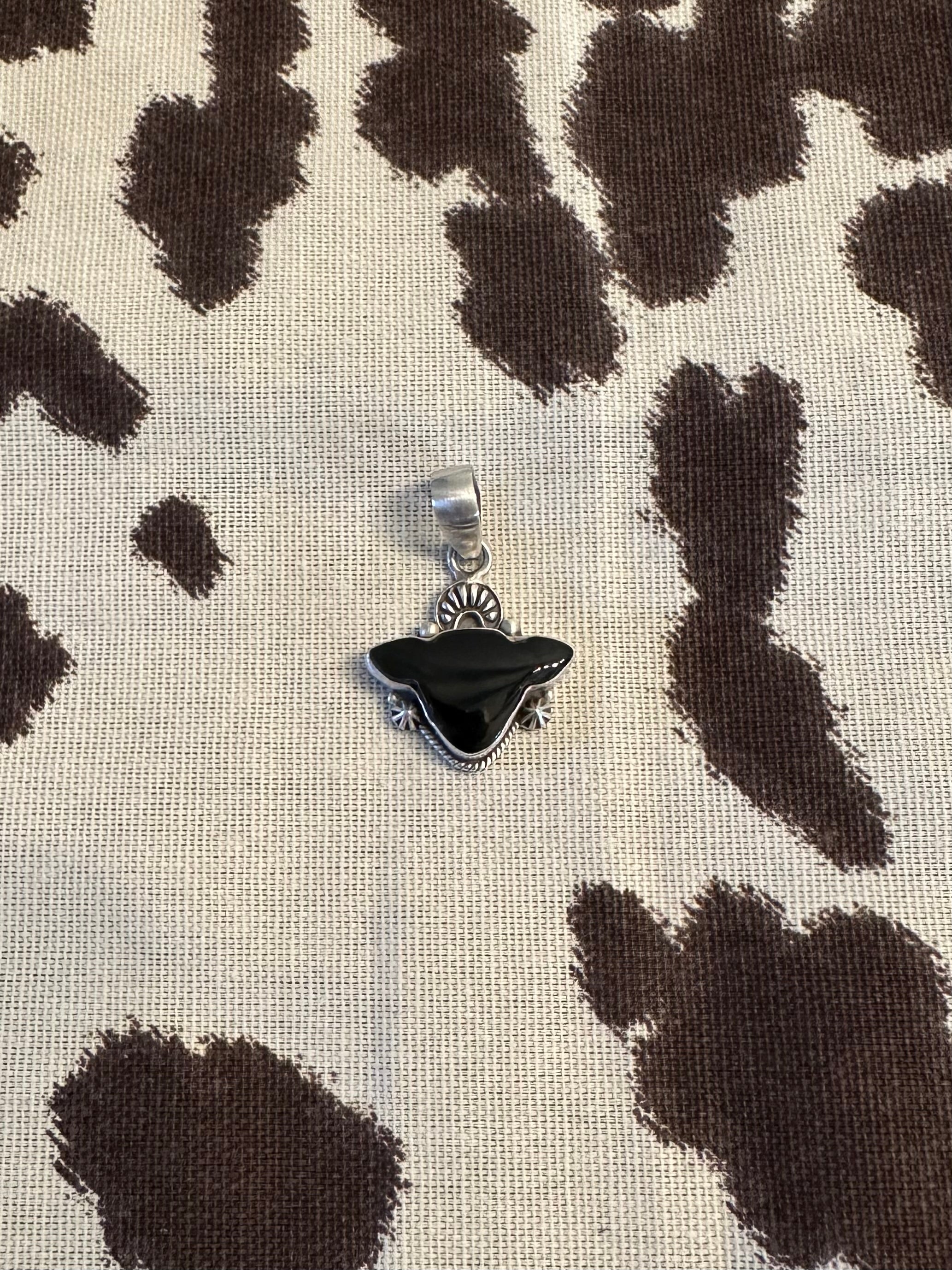 Black onyx cowhead pendant