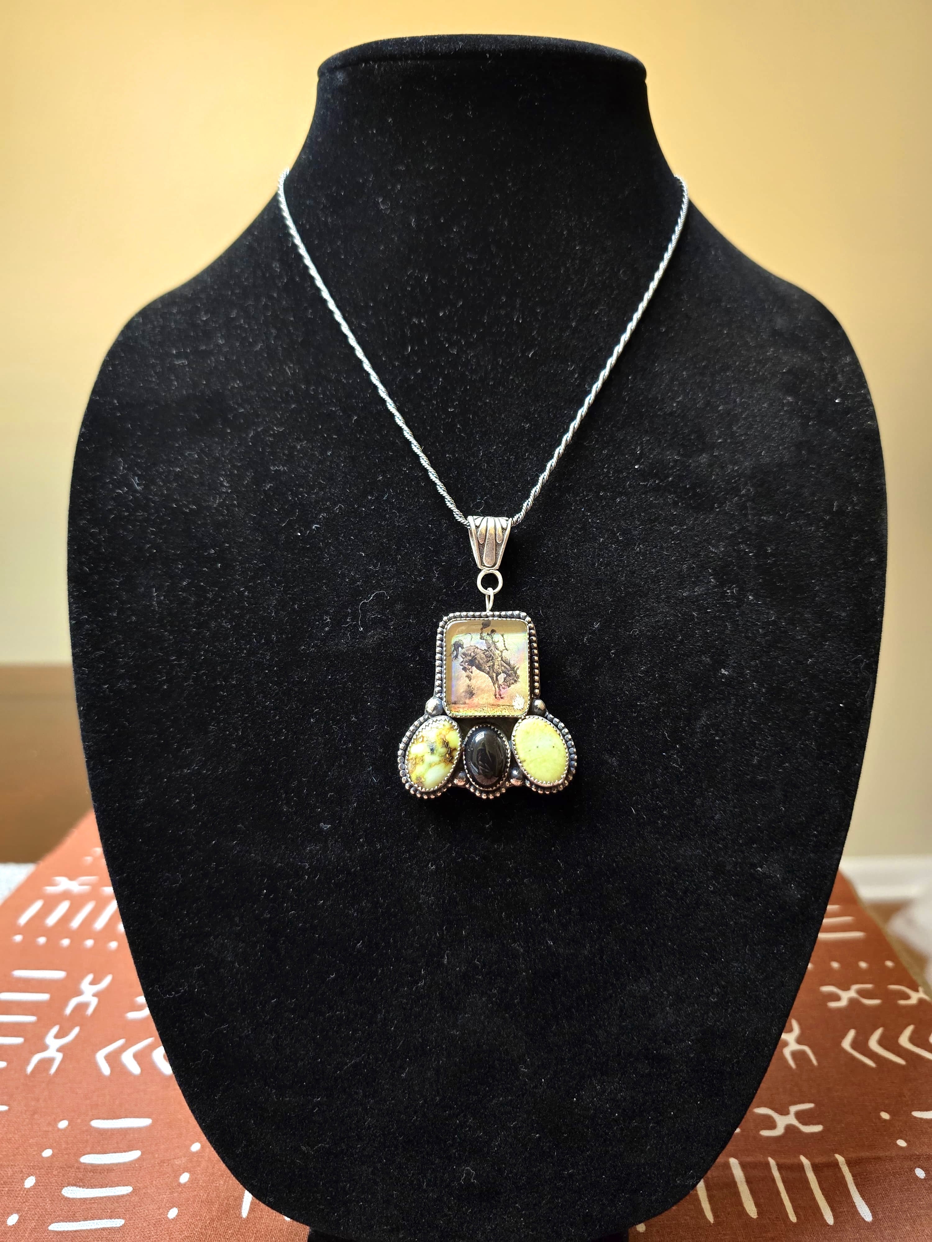 Bucking horse necklace with palomino and black onyx